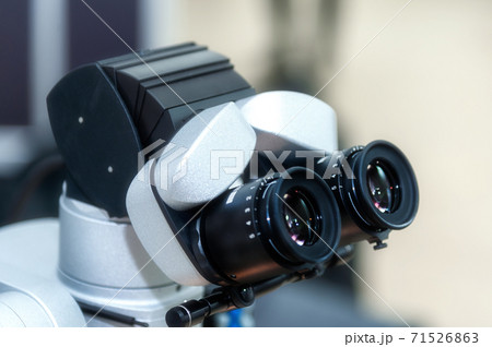 Microscope in the dental office 71526863