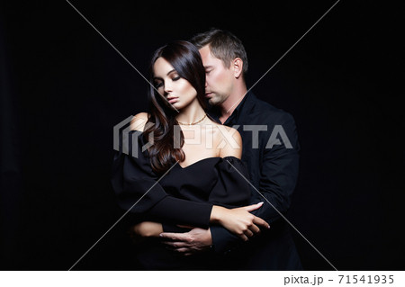 elegant girl seducing her handsome boyfriend elegant girl seducing her handsome boyfriend 71541935