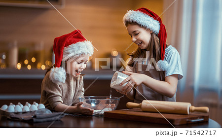 Cooking Christmas cookies Cooking Christmas cookies 71542717
