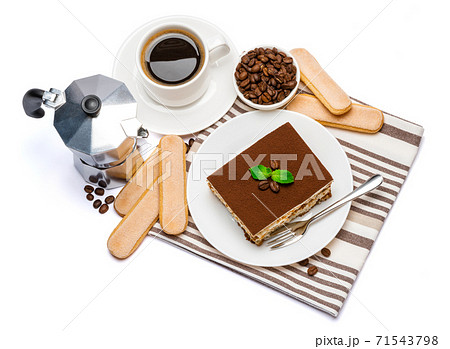 Traditional Italian Tiramisu dessert square portion on ceramic plate, mocha coffee maker, savoiardi cookies and cup of fresh espresso coffee isolated on white background with clipping path 71543798