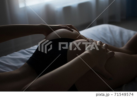 Sensual naked woman in lingerie on bed in room Stock Photo by ©3kstudio  278524656