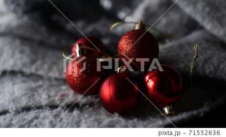Red christmas balls on a grey backgroud, copy space Red christmas balls on a grey backgroud, copy space 71552636