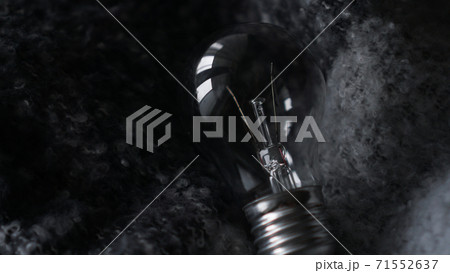 Light Bulb On a gray knitted background Light Bulb On a gray knitted background 71552637