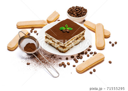 Traditional Italian Tiramisu dessert square portion on ceramic plate and savoiardi cookies isolated on white Traditional Italian Tiramisu dessert square portion on ceramic plate and savoiardi cookies isolated on white 71555295