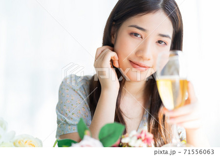 Single woman, drinking 71556063