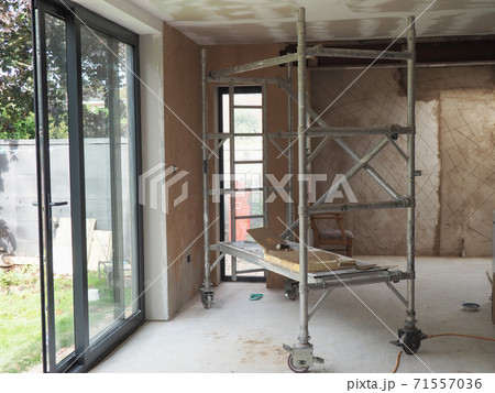 Property renovation plastering of walls, unercoat layer Property renovation plastering of walls, unercoat layer 71557036