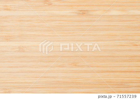 Wood texture background in natural light yellow cream color . 71557239