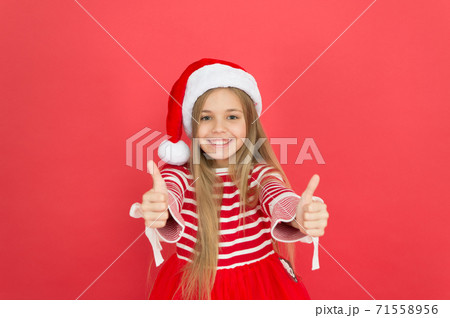 Best wishes. Joyful kid. Child santa costume believe in miracle. Girl little kid Best wishes. Joyful kid. Child santa costume believe in miracle. Girl little kid 71558956