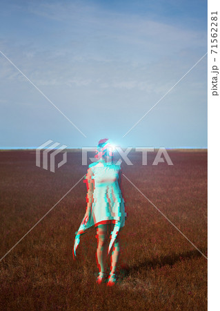 Woman goes into virtual reality using virtual reality headset. Image with glitch effect. Woman goes into virtual reality using virtual reality headset. Image with glitch effect. 71562281