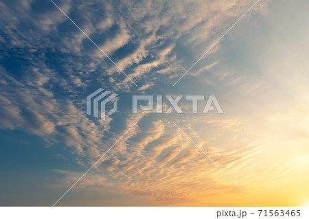 Dramatic colorful red purple to blue sunset or sunrise sky landscape. Natural beautiful cloudscape dawn background wallpaper. Stormy windy nature twilight dusk scene panorama 71563465