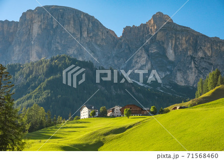 Corvara village, alpine village in Dolimite Alps at sunny summer day, Italy 71568460