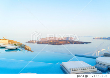 Pool and view of Santorini caldera 71569596