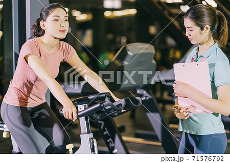 Woman gym, trainer 71576792