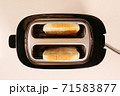 Close up of toaster with two slices of toast 71583877