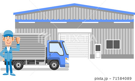 倉庫とトラックの前でガッツポーズする作業着の男性 71584089