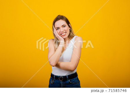 Headshot of happy emotional woman laughing from the bottom of her heart Headshot of happy emotional woman laughing from the bottom of her heart 71585746