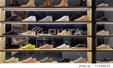 Unbranded footwear on display in a shop window Unbranded footwear on display in a shop window 71588630