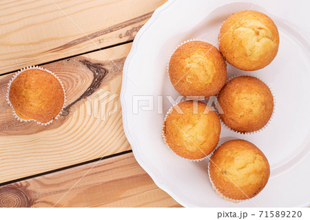 Baked muffin on wood 71589220