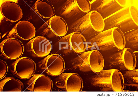 Black metal pipes and adapters of different diameters for gasification or water supply. Industrial background Black metal pipes and adapters of different diameters for gasification or water supply. Industrial background 71595015