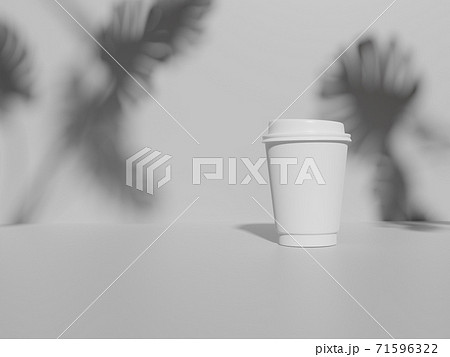 Paper coffee cup mock-up with Monstera leaves shadow on white background. 3D rendering. Paper coffee cup mock-up with Monstera leaves shadow on white background. 3D rendering. 71596322