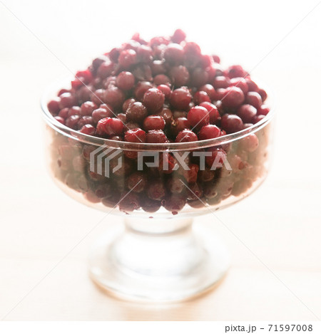Berries of currants, lingonberries, cranberries with frost and ice 71597008