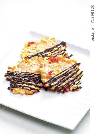 still life of cookies with candy fruit, nuts and chocolate still life of cookies with candy fruit, nuts and chocolate 71599126
