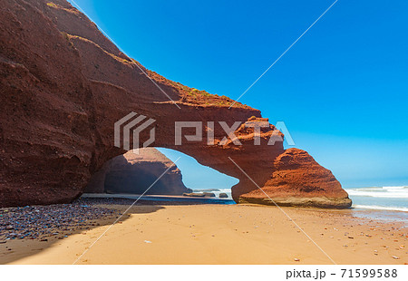 Red arches of Legzira beach, Morocco. Red arches of Legzira beach, Morocco. 71599588