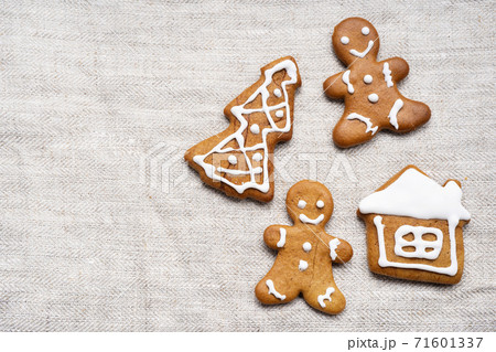 Gingerbread for Christmas on light wrinkled fabric 71601337