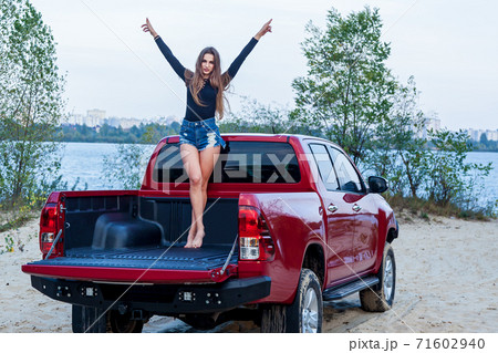 Girl posing near the car 71602940