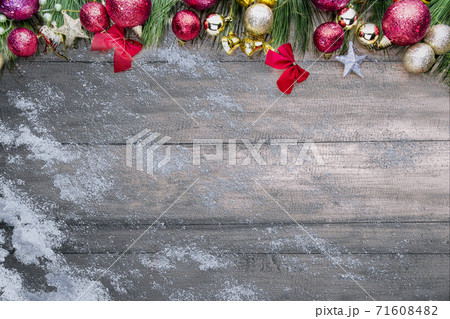 Christmas ornaments and decorations on wooden table 71608482