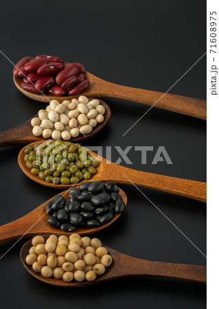 Collection of whole grains seeds isolated on black background. Collection of whole grains seeds isolated on black background. 71608975
