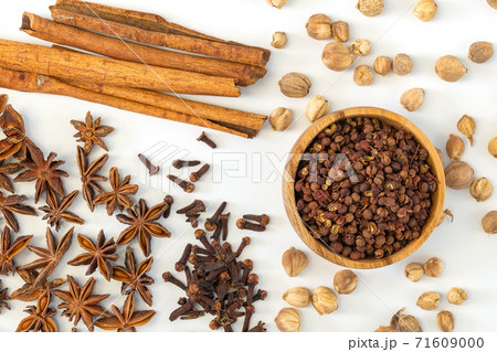 Assorted colorful spices on a white background. Assorted colorful spices on a white background. 71609000