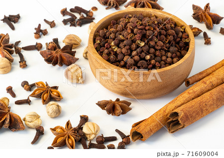 Assorted colorful spices on a white background. Assorted colorful spices on a white background. 71609004