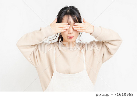 Serious Woman Adjusts Blindfold Over Her Eyes Stock Photo, Picture and  Royalty Free Image. Image 70769576.