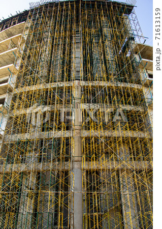 Scaffolding building frame on a building Scaffolding building frame on a building 71613159