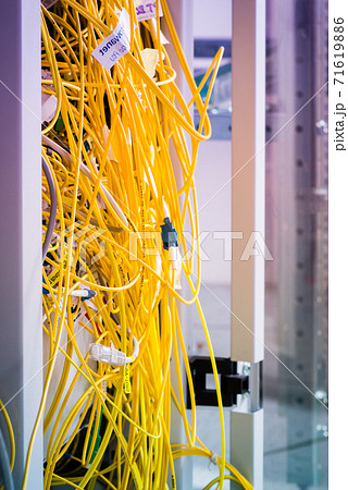 server with connected fiber optics cables 71619886