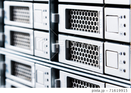 Array of data storage hard drives in internet data center 71619915