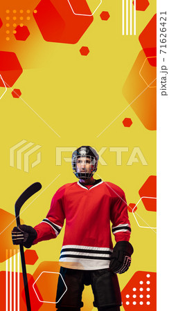 Male hockey player with the stick on orange-red geometric styled background, vertical flyer. 71626421