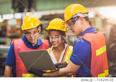 engineer team mix race brainstorming join working together in heavy industry engineer team mix race brainstorming join working together in heavy industry 71629518