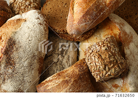 Fresh baked bread on whole background, close up Fresh baked bread on whole background, close up 71632650