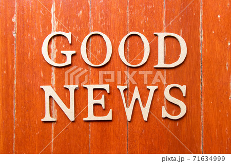 Alphabet letter in word good news on old red color wood plate background Alphabet letter in word good news on old red color wood plate background 71634999