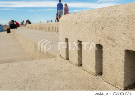 People sitting by Sea Organ People sitting by Sea Organ 71635779