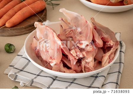Fresh chicken skeletons with meat and vegetables - ingredients to prepare bone broth 71638093