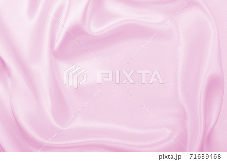Smooth elegant pink silk or satin texture as wedding background. Luxurious background design Smooth elegant pink silk or satin texture as wedding background. Luxurious background design 71639468