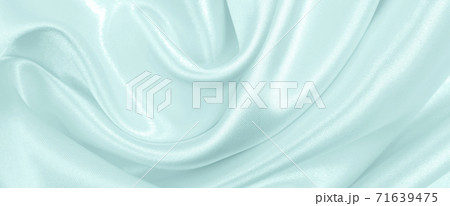 Smooth elegant blue silk or satin luxury cloth texture as abstract background. Luxurious background design 71639475