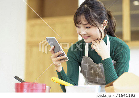 Valentine's Day Women Taking Homemade Chocolate 71641192