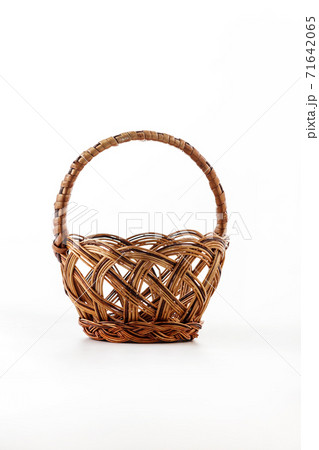 a Empty wicker basket on white background 71642065