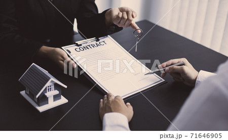 Real estate broker has given the house to customers who bought the house with insurance, Negotiating purchase-sale and investment planning concept. 71646905