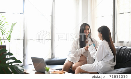 LGBT couple is talking and relaxing at the black LGBT couple is talking and relaxing at the black 71651056