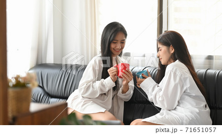 LGBT couple is talking and relaxing at the black LGBT couple is talking and relaxing at the black 71651057